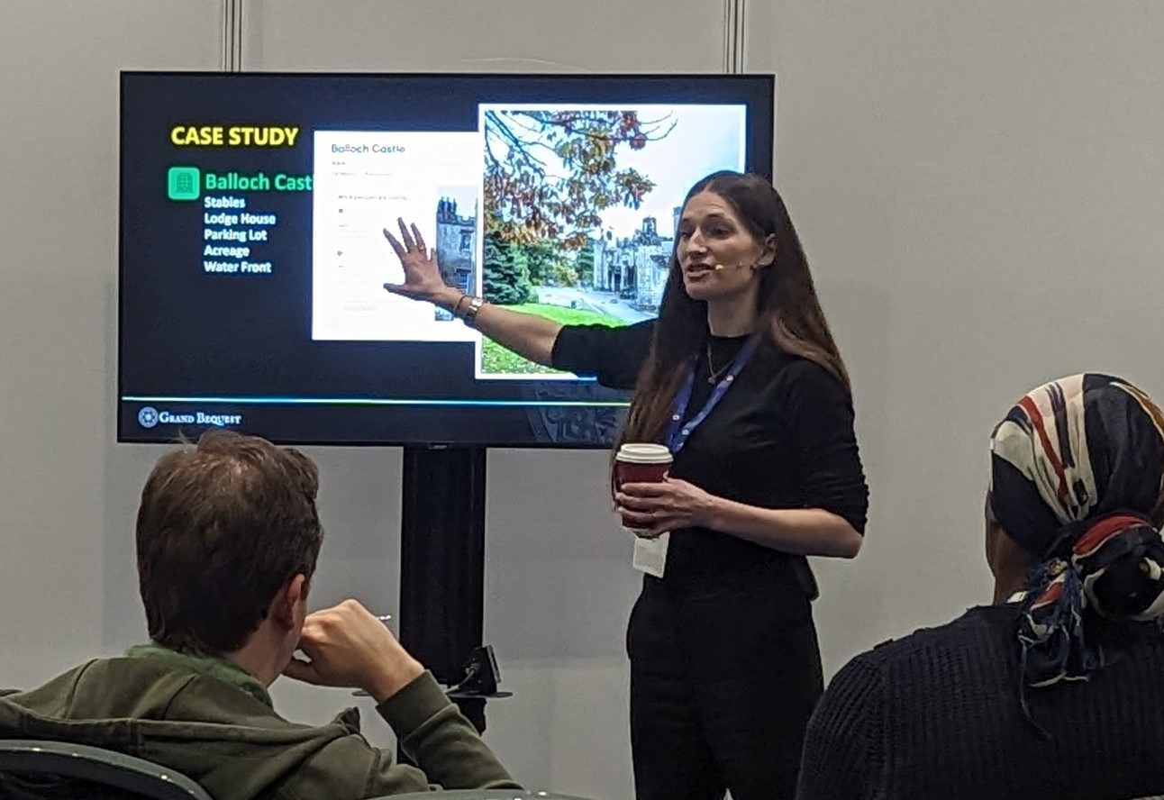 Image of Katherine Gunderson talking about her company Grand Bequest is powering communities to regenerate empty buildings into social homes.