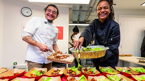 two Crisis caterers serving healthy food