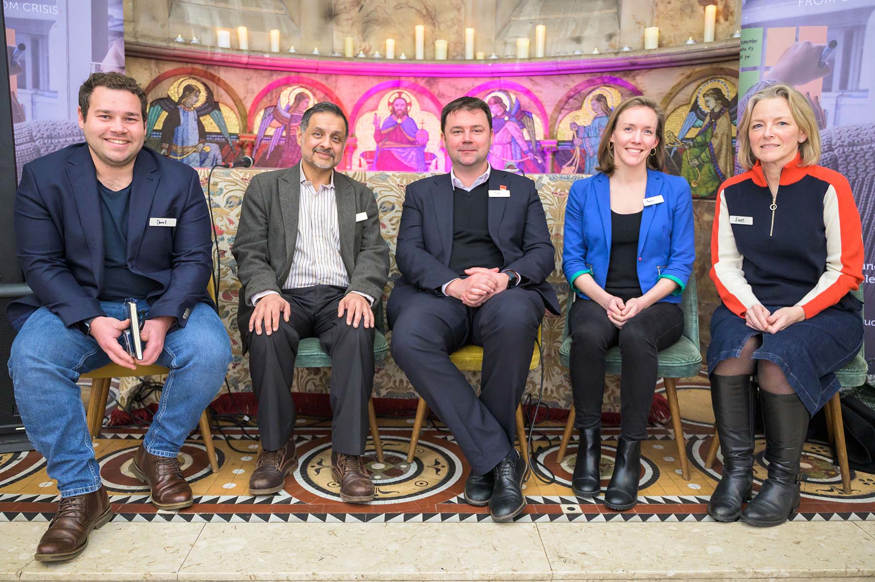 People on a panel discussing how to fund a housing revolution. From left to right: Daniel Mohamed (Urban Intelligence), Waqar Ahmed (Crisis Trustee), Matt Downie (Crisis CEO), Amelie Montague (Investment Committee), Sue Siddall (Strategic Advisory Board).